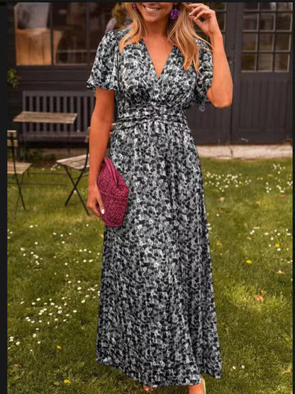 Elis – Longue robe fluide à motif floral